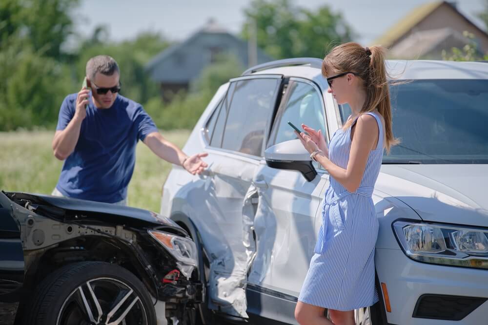 Man on the phone calling to report accident in the highway.